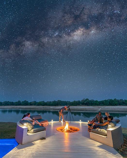 Outdoor seating by fire, stargazing at Beyond Green