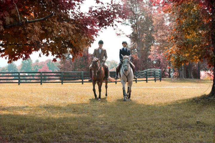 Two women on horseback, Salamander Resort Collection 