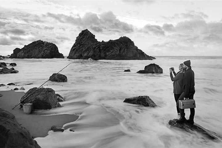 A couple photographing the landscape