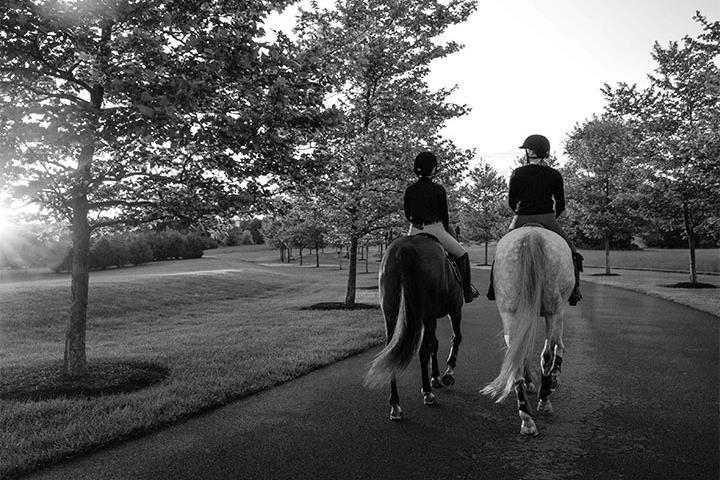 Two women on horseback, Salamander Resort Collection 